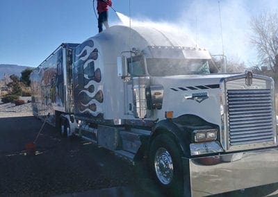 Detailing semi with white flames