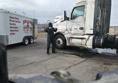 Washing dirty FedEx semi